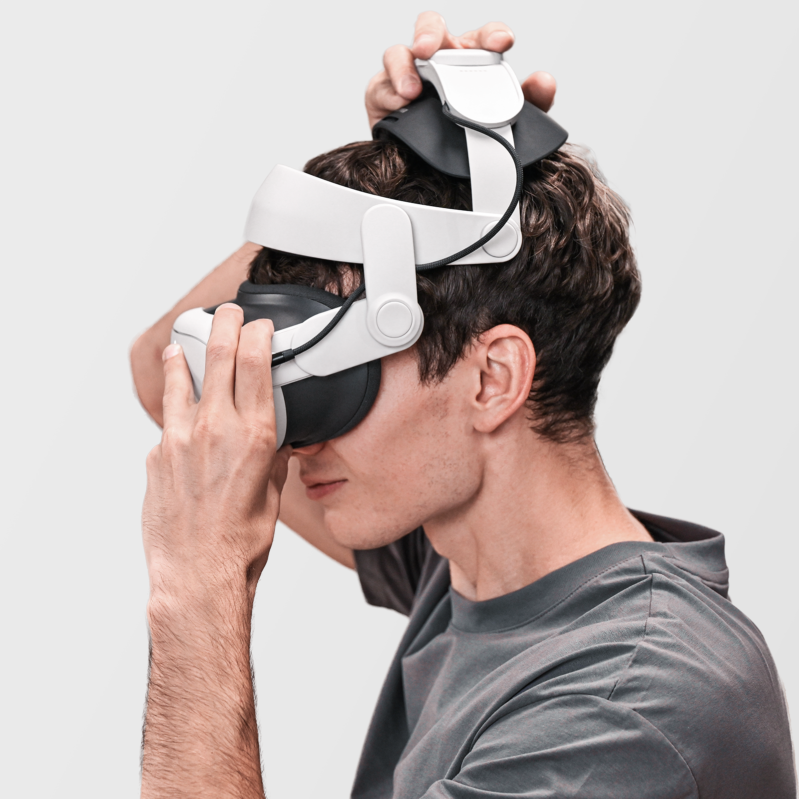 Adjusting Meta Quest 3 battery head strap on VR headset
